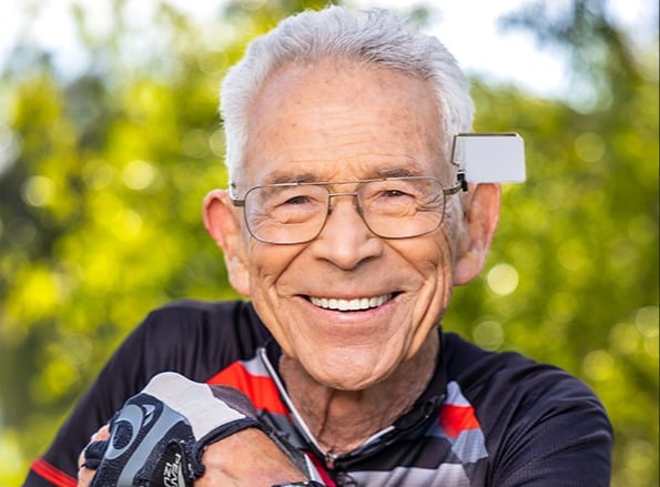 Closeup of smiling senior man in glasses